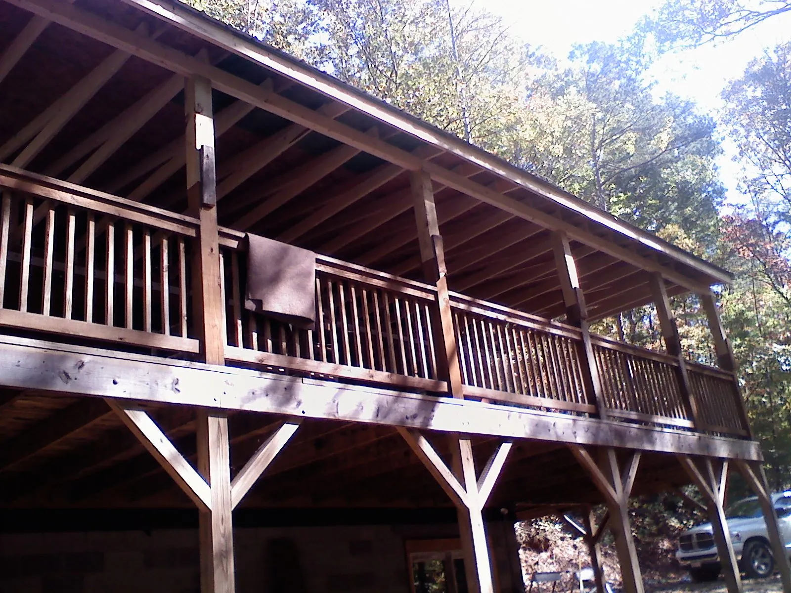 Timber framing under a new elevated porch and deck — Roof Leak Repair in White Post by Roofing Brothers